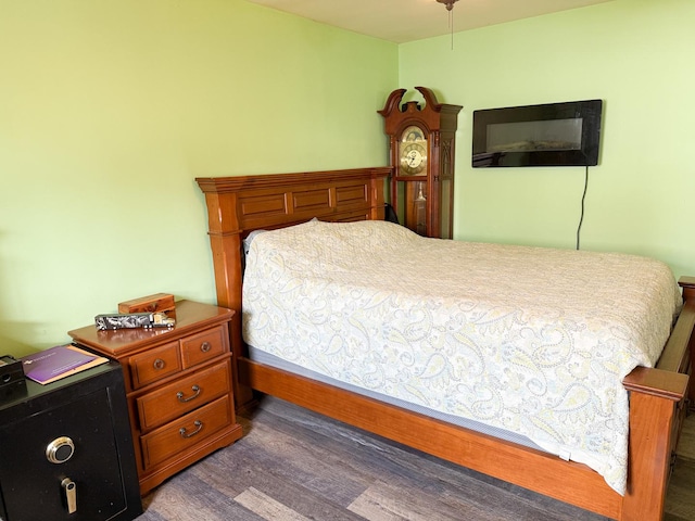 bedroom featuring wood finished floors