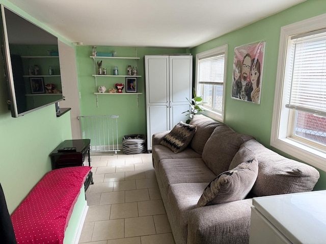 tiled living area featuring radiator