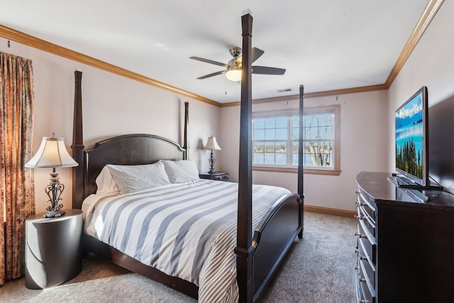 bedroom with visible vents, baseboards, ornamental molding, carpet floors, and a ceiling fan