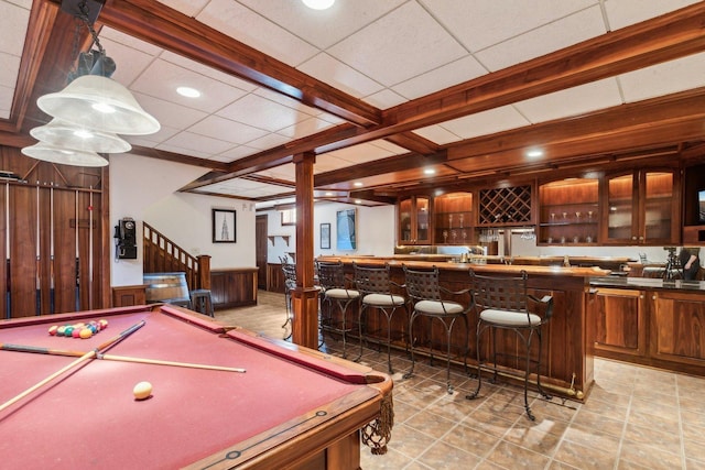 recreation room featuring indoor bar, a wainscoted wall, beamed ceiling, recessed lighting, and billiards