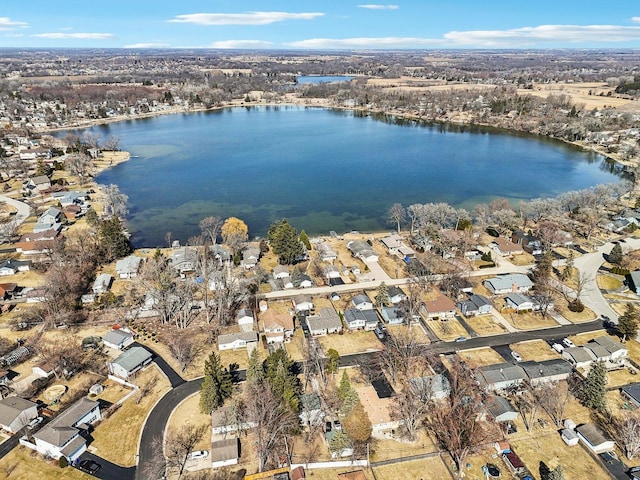 aerial view featuring a residential view and a water view