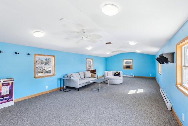 carpeted living room with baseboards, baseboard heating, a ceiling fan, and vaulted ceiling