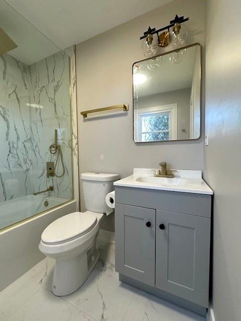 full bath featuring marble finish floor, shower / bathing tub combination, toilet, vanity, and baseboards