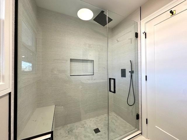 bathroom with a stall shower