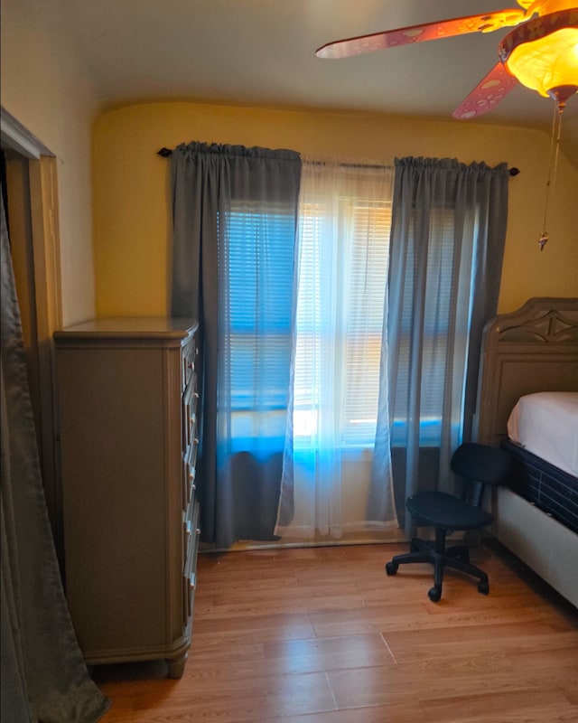 bedroom featuring ceiling fan and light wood-type flooring