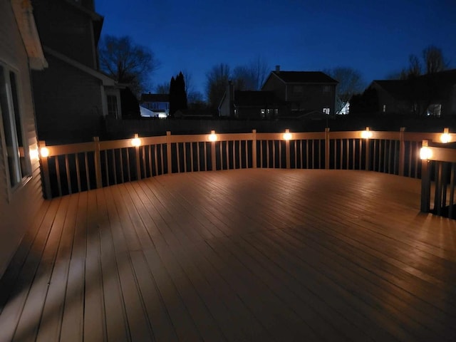 view of deck at twilight