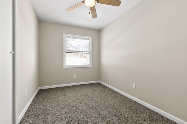 empty room featuring ceiling fan, baseboards, and carpet flooring