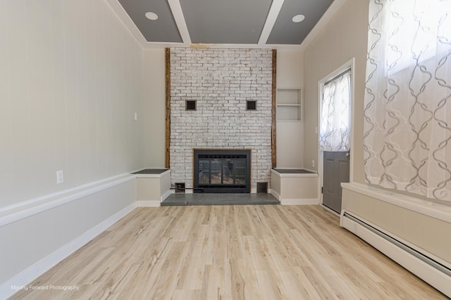 unfurnished living room featuring baseboards, a baseboard radiator, light wood-style flooring, and a brick fireplace