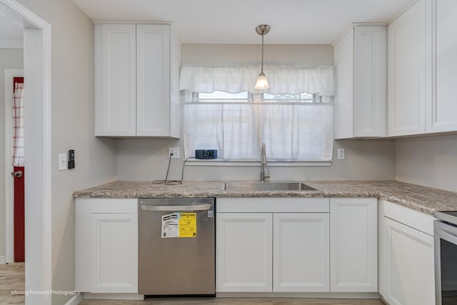 kitchen featuring decorative light fixtures, white cabinetry, a sink, light stone countertops, and dishwasher