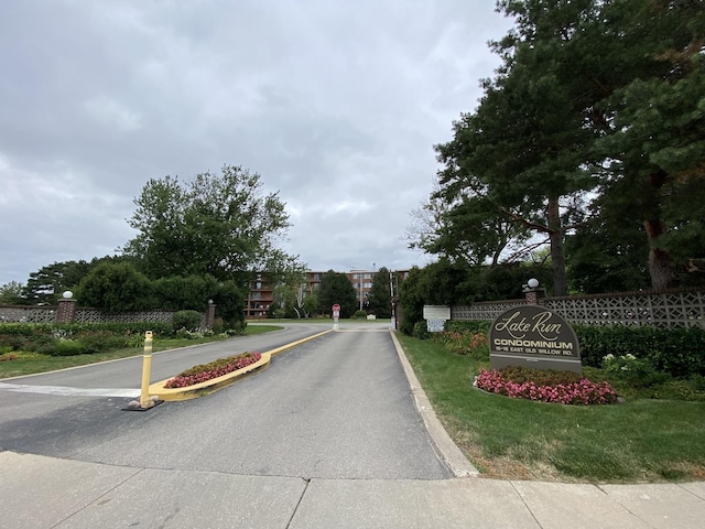 view of street with curbs