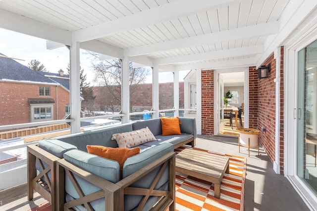 sunroom / solarium with beam ceiling