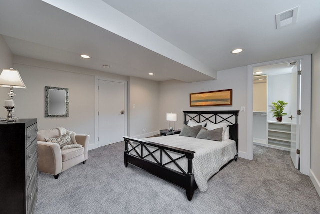 bedroom featuring light carpet, baseboards, visible vents, and recessed lighting