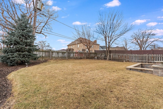 view of yard featuring a fenced backyard