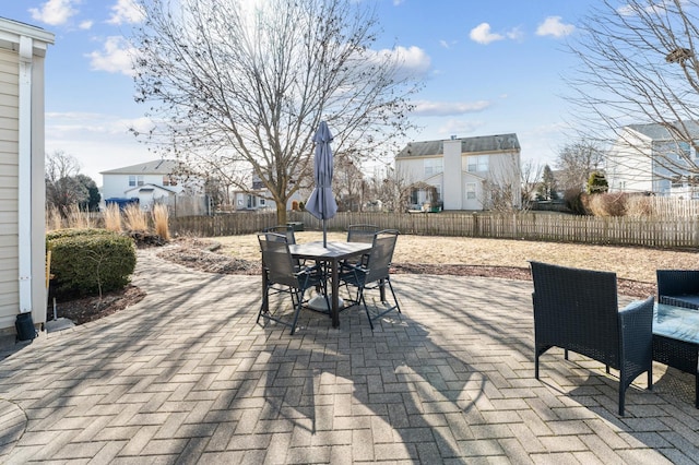 view of patio / terrace with outdoor dining space and a fenced backyard