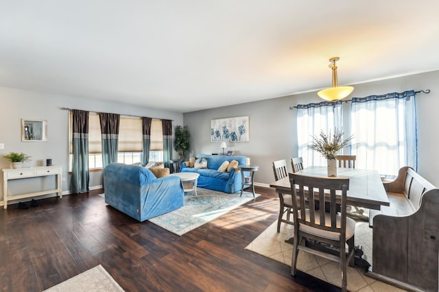 interior space with wood finished floors and baseboards