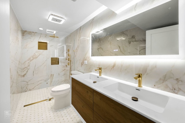 bathroom with visible vents, a sink, toilet, and tile walls