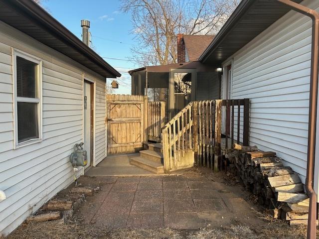 exterior space with a patio area and fence