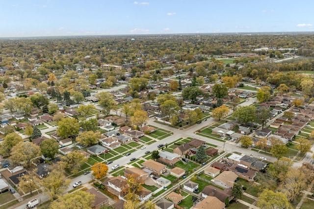 birds eye view of property with a residential view