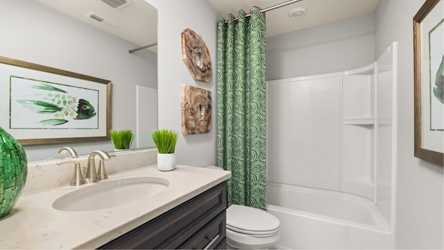 full bathroom featuring toilet, visible vents, shower / tub combo with curtain, and vanity