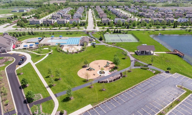 bird's eye view with a water view and a residential view