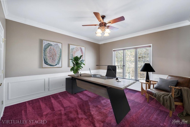 office with a ceiling fan, dark colored carpet, and wainscoting