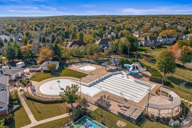 birds eye view of property with a residential view