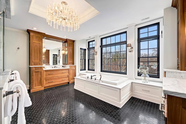 full bathroom featuring a tray ceiling, granite finish floor, crown molding, and visible vents