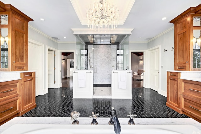 bathroom featuring recessed lighting, a shower stall, ornamental molding, and vanity