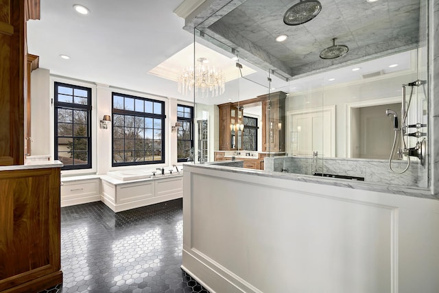 bathroom featuring visible vents, walk in shower, a chandelier, recessed lighting, and vanity