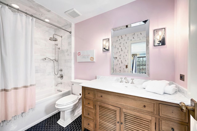 full bathroom with vanity, toilet, visible vents, and shower / bath combo