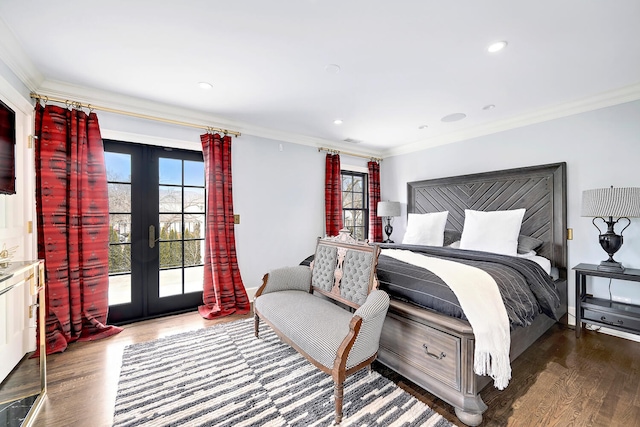 bedroom featuring french doors, wood finished floors, and access to exterior