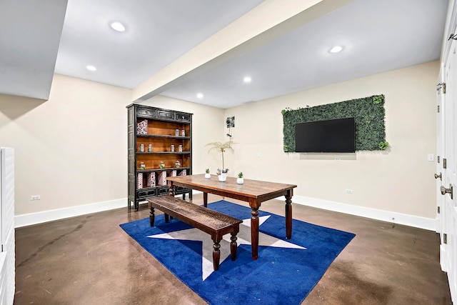 dining area with recessed lighting, baseboards, and concrete floors