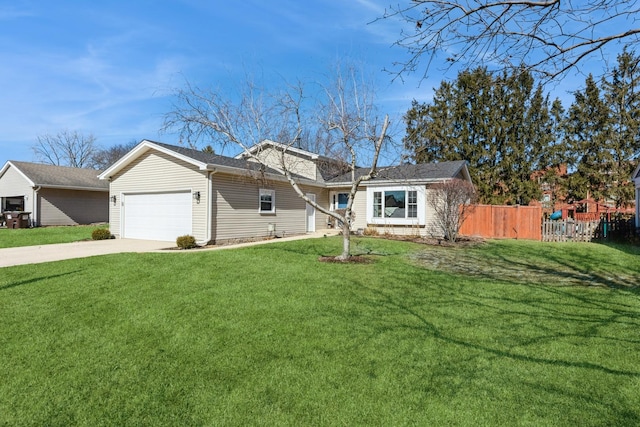 view of front of home with a front lawn, an attached garage, fence, and concrete driveway