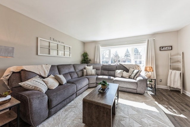 living area featuring wood finished floors and baseboards