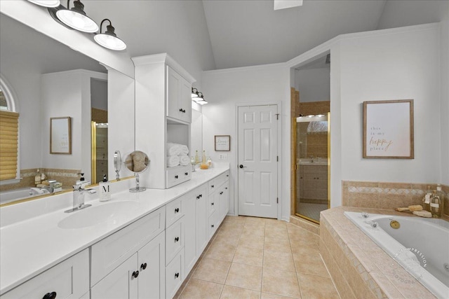 full bath featuring lofted ceiling, a sink, a garden tub, and a shower stall