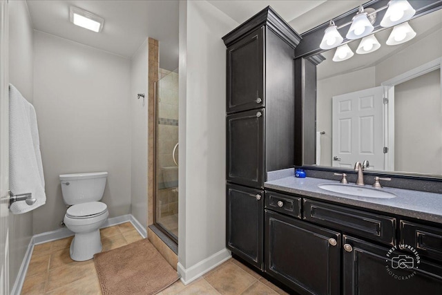 full bath featuring tile patterned flooring, toilet, vanity, baseboards, and a shower stall