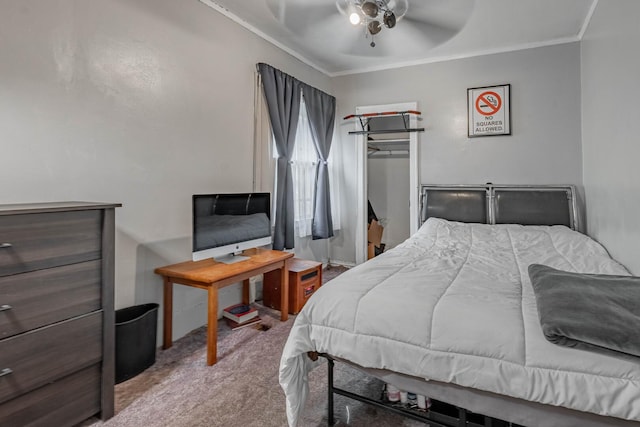 carpeted bedroom featuring ornamental molding and ceiling fan