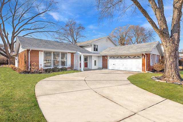 traditional-style house with a front yard, driveway, roof with shingles, a garage, and brick siding