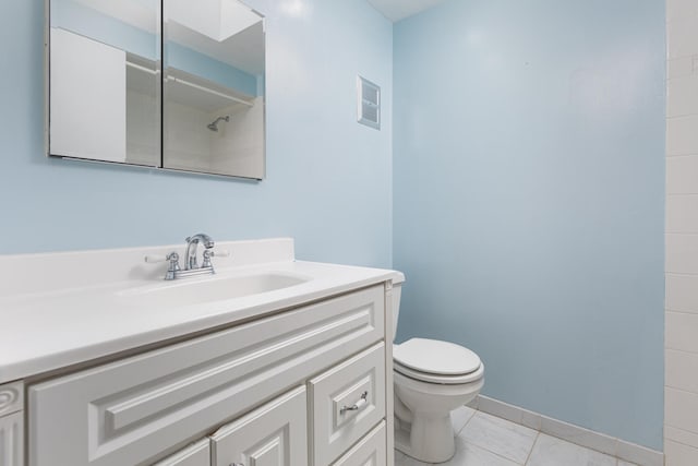 full bath with vanity, baseboards, visible vents, walk in shower, and toilet