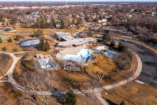 birds eye view of property with a residential view