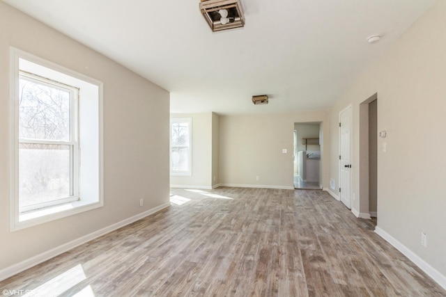 1803 Guion St, Ottawa, IL 61350 - unfurnished room featuring baseboards and light wood-style floors