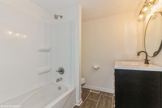 1803 Guion St, Ottawa, IL 61350 - bathroom with toilet, vanity, shower / tub combination, and baseboards
