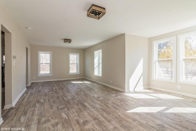 1803 Guion St, Ottawa, IL 61350 - spare room with baseboards and wood finished floors
