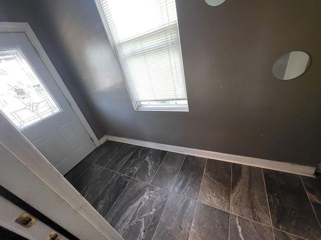 entrance foyer with baseboards