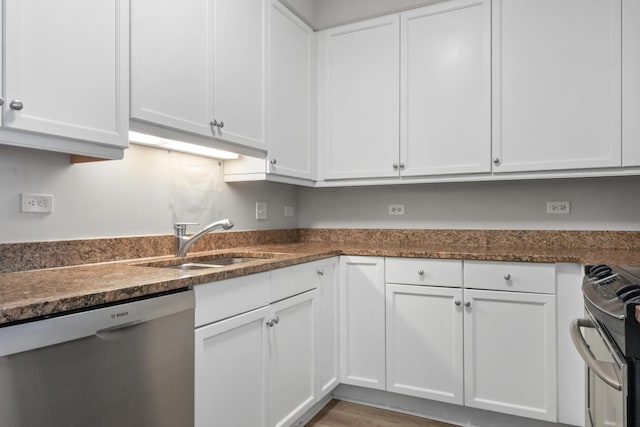 kitchen with a sink, electric stove, white cabinetry, and stainless steel dishwasher