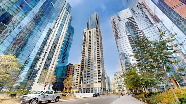 view of building exterior featuring a view of city