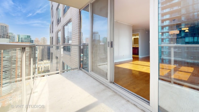 balcony featuring a city view