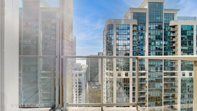 balcony featuring a city view