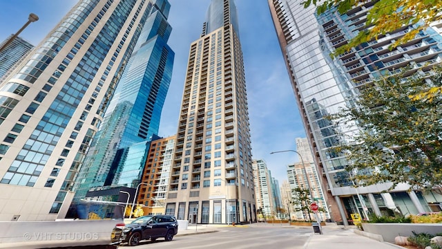 view of building exterior featuring a city view