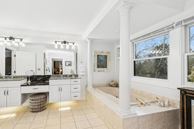 full bathroom featuring ornamental molding, vanity, tile patterned flooring, ornate columns, and a bath